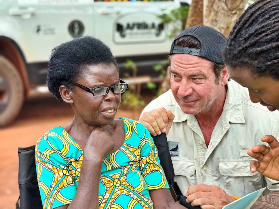 Rwanda Akagera NP reading glasses for the elderly Ross Holgate